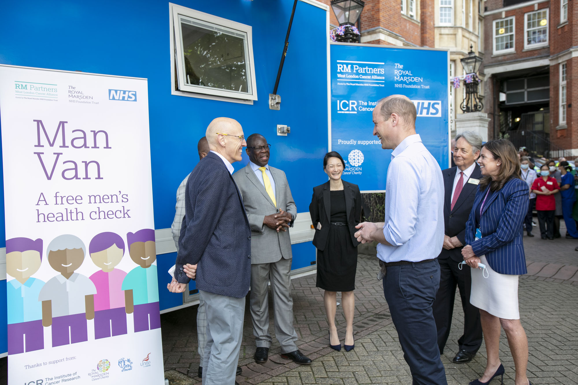 HRH The Duke of Cambridge speaking to staff and Man Van patients outside Man Van